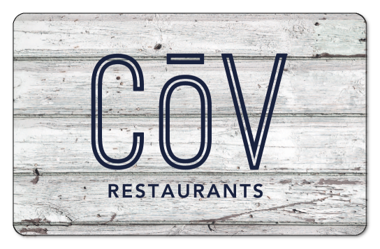 COV Restaurants logo in blue over a wooden background.